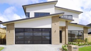 Modern home with full-view garage doors